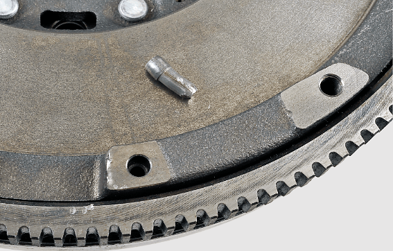 Folded or incorrectly fitted dowel pins.