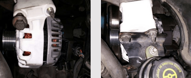 Mechanic using second screw install alternator in engine chamber.