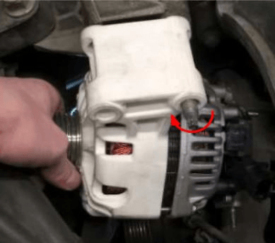 Operator must rotate alternator around bolt